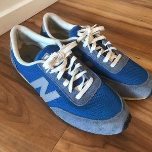 Men’s New Balance tennis shoes.